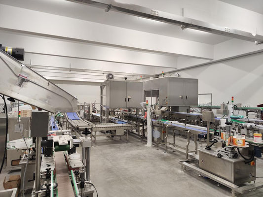 Całkowicie automatyczna linia produkcyjna kartonowania i paletyzowania